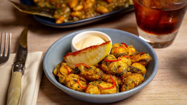 The crisp fried mussels are terrific — especially with a crisp lager beside.