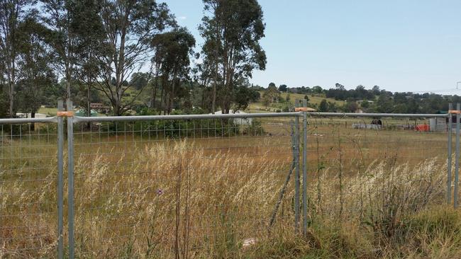 The empty paddock where a multistorey development is planned. Picture: Lawrence Machado