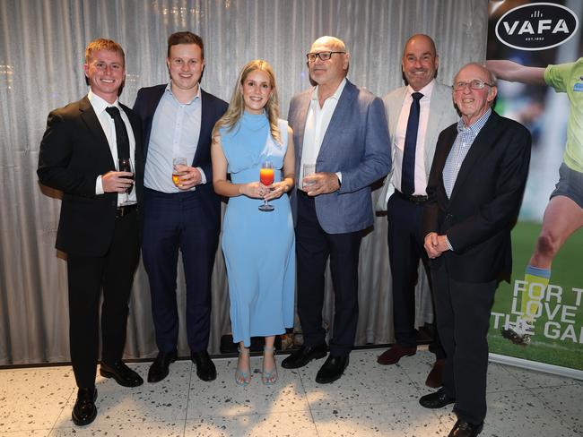 MELBOURNE, AUSTRALIA – OCTOBER 9 2024Billy Murphy, Jake Erman, Sienna WhitemanJeff, David, Lawrence at the VAFA Awards Night at the San Remo Ballroom in Carlton on October 9, 2024Picture: Brendan Beckett