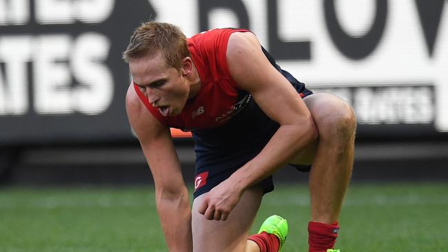 Bernie Vince copped a punch to the guts from Kangaroo Ben Cunnington on Sunday. Picture: AAP