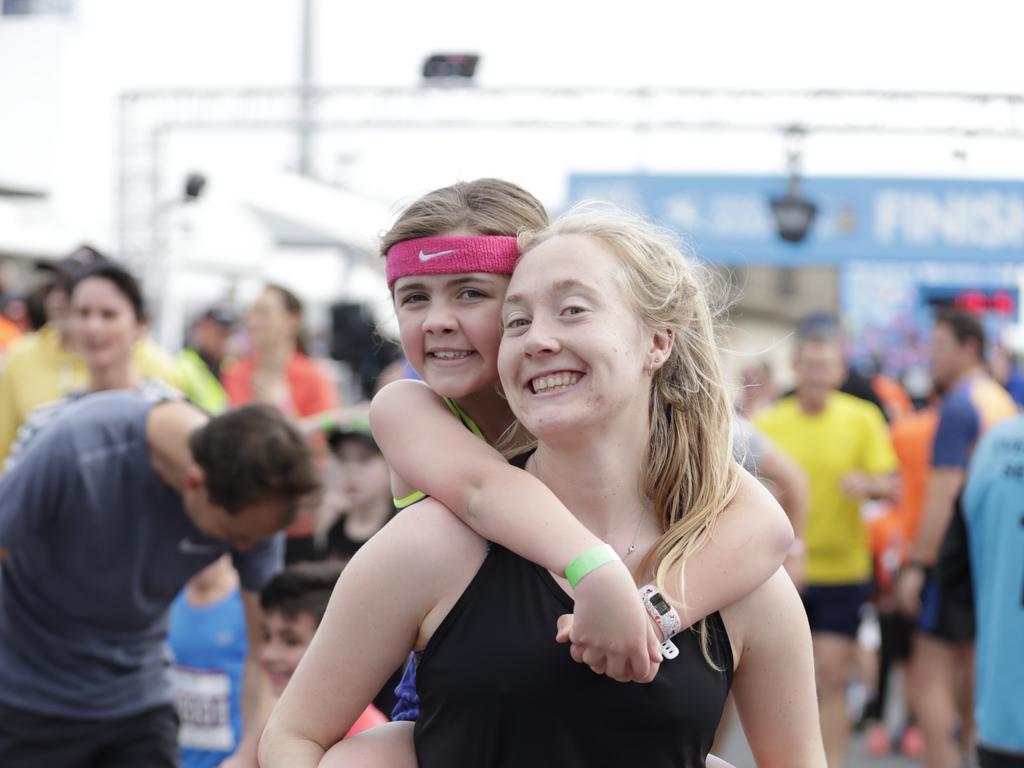 Bec Barry and Sophie Schuwalow at the finish of the Two Kilometre Junior Dash. Picture: Tim Marsden.