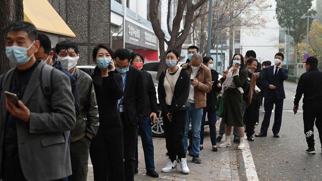 People line up to get Covid-19 tests in Beijing on November 4, 2021. Picture: Greg Barker/AFP