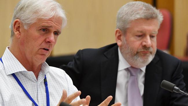 CEO Bill Morrow and Minister for Communications Mitch Fifield at a Senate Estimates hearing earlier in the year. Picture: Mick Tsikas