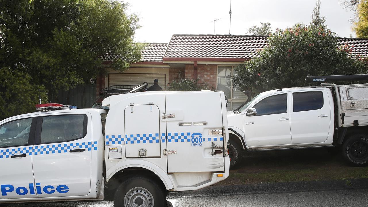 Police at the home where a baby was tragically mauled to death on the NSW Central Coast. Picture: David Swift