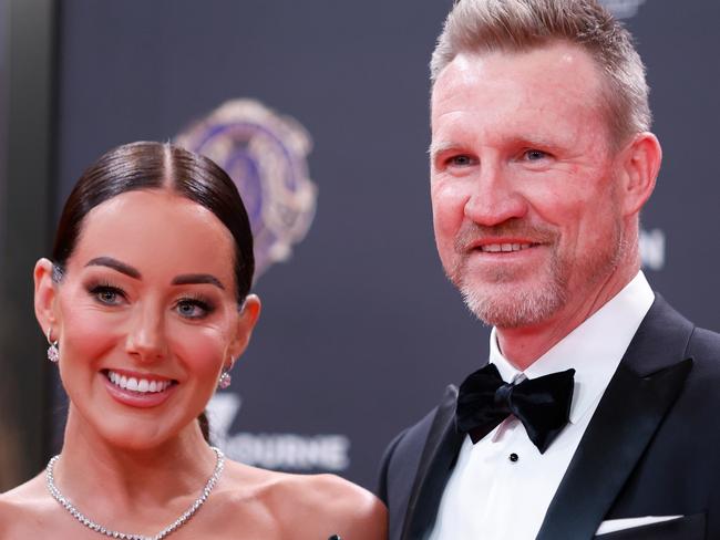 Inside footy glamour couple’s shock split