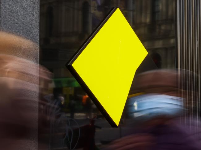 MELBOURNE, AUSTRALIA - MAY 03: People are seen walking past a Commonwealth Bank of Australia branch on May 03, 2022 in Melbourne, Australia. The Reserve Bank of Australia has today lifted the official interest rate to 0.35 per cent following a meeting today. The rise is the first interest rate increase since November 2010. (Photo by Asanka Ratnayake/Getty Images)