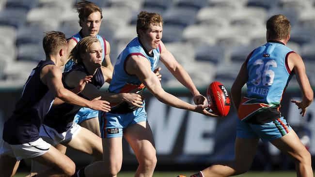 Allies star Tom Green fires out a handball at the recent Under-18 National Championships. Picture: Dylan Burns/AFL Photos