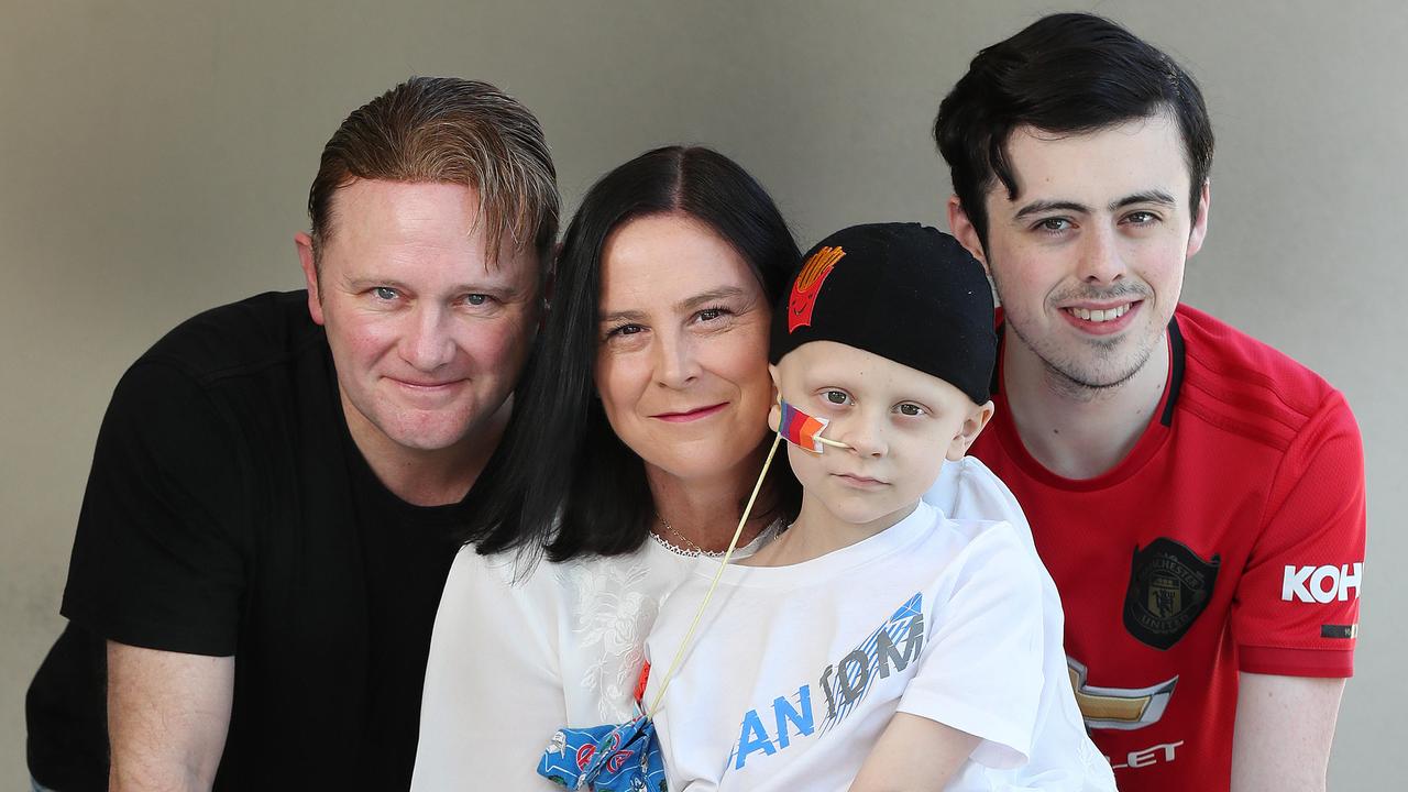 Nine-year-old Wakerley boy Richie Walsh was diagnosed with a rare cancer called Rhabdomyosarcoma. Picture with Karl, Lisa and Luke Walsh. Pic: Annette Dew