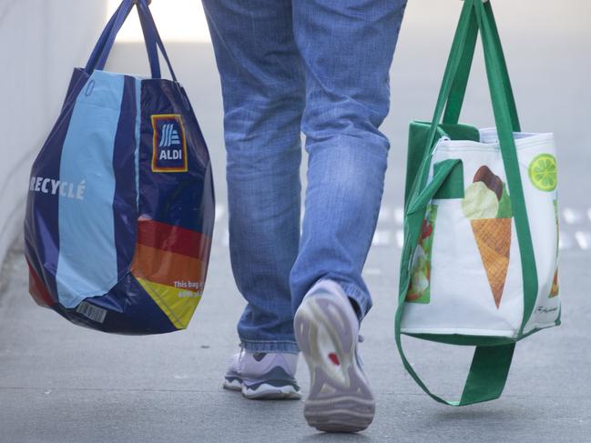 BRISBANE, AUSTRALIA - NewsWire Photos - JUNE 19, 2024: Generic photo of Australian shopping centre ALDI and Woolworths bags.Picture: NewsWire / Glenn Campbell