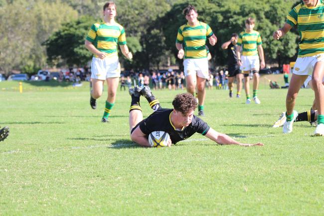 Huw Griffiths scores for St Laurence’s in 2024.