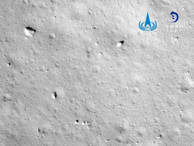 This picture taken on December 1, 2020 and released on December 2, 2020 by the China National Space Administration (CNSA) via CNS shows an image taken by the camera attached to the Chang'e-5 spacecraft during its landing process on the moon. - An unmanned Chinese spacecraft landed on the Moon on December 1, state media reported, the latest milestone in a mission to collect samples from the lunar surface. (Photo by - / China National Space Administration (CNSA) via CNS / AFP) / China OUT