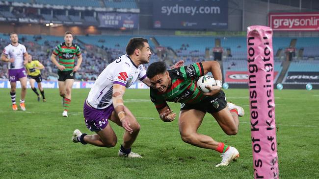 Hymel Hunt crosses for a try out wide. Picture: Brett Costello