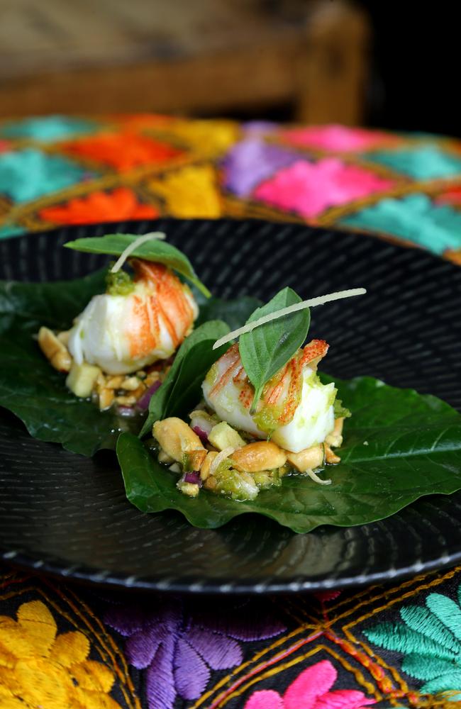 The Moreton Bay bug entree ($17) was a tiny morsel of bug meat, peanuts and ginger served on a betel leaf with a squirt of nam jim that verged on the sweet and sour. Picture AAP/David Clark