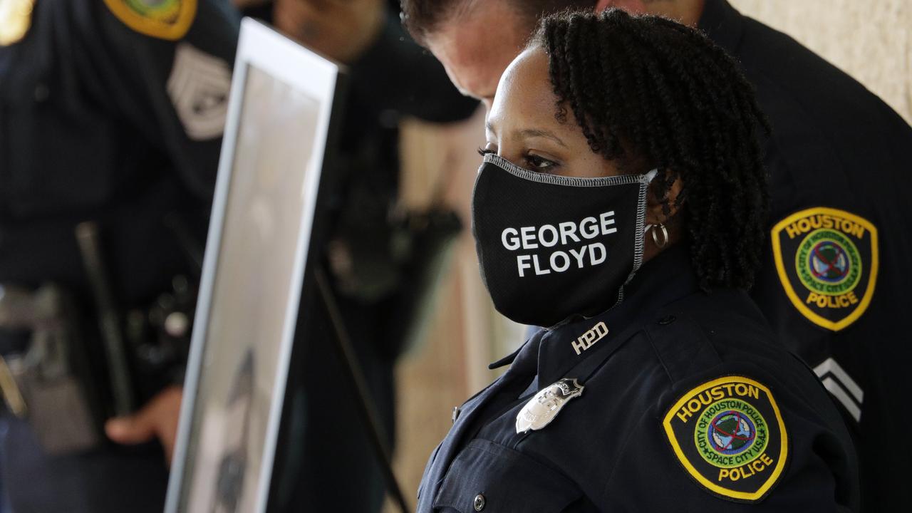 Houston police stand watch at the funeral. Picture: Eric Gay/AP