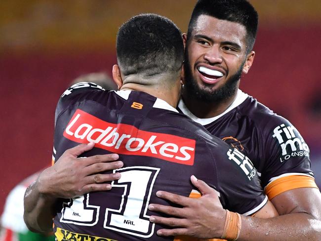 David Fifita (left) and Payne Haas (right) of the Broncos celebrate winning the round two NRL match between the Brisbane Broncos and South Sydney Rabbitohs at Suncorp Stadium in Brisbane, Friday, March 20, 2020. (AAP Image/Darren England) NO ARCHIVING, EDITORIAL USE ONLY