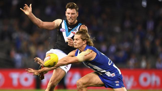 Jed Anderson smothers the ball. (Photo by Quinn Rooney/Getty Images)