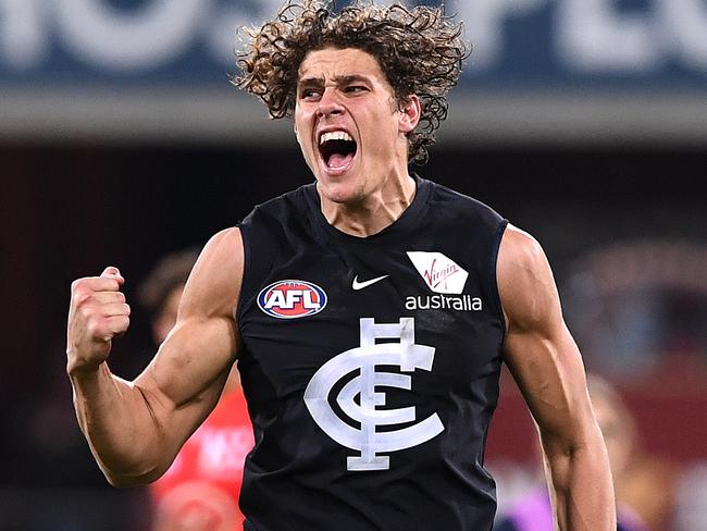 Charlie Curnow of the Blues reacts after kicking a goal during the Round 19 AFL match between the Gold Coast Suns and the Carlton Blues at Metricon Stadium at Carrara on the Gold Coast, Saturday, July 28, 2018. (AAP Image/Dave Hunt) NO ARCHIVING, EDITORIAL USE ONLY