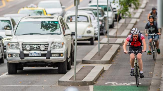 A plan for dedicated bike lanes across Melbourne’s central business district is flagged in the report.