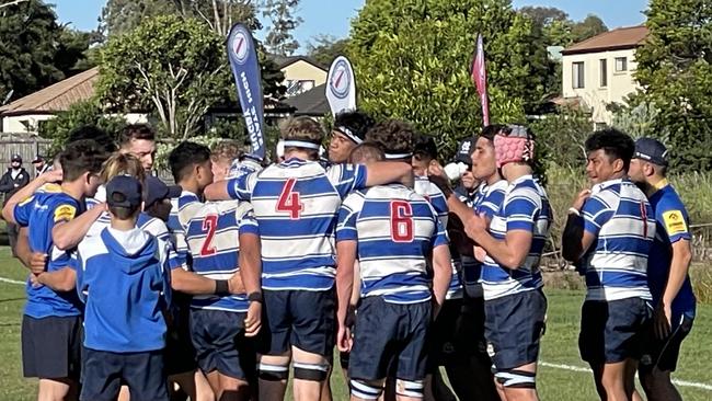 Nudgee college in a huddle