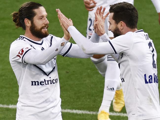 MELBOURNE, AUSTRALIA - MAY 28: Jacob Butterfield of the Victory (L) celebrates a goal with Storm Roux of the Victory during the A-League match between Western United and Melbourne Victory at AAMI Park, on May 28, 2021, in Melbourne, Australia. (Photo by Daniel Pockett/Getty Images)