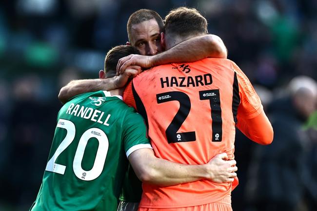 Plymouth players celebrate their stunning win over Liverpool in the FA Cup fourth round