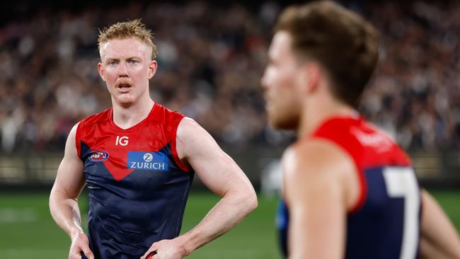 MELBOURNE, AUSTRALIA - SEPTEMBER 15: Clayton Oliver of the Demons looks dejected after a loss  during the 2023 AFL First Semi Final match between the Melbourne Demons and the Carlton Blues at Melbourne Cricket Ground on September 15, 2023 in Melbourne, Australia. (Photo by Dylan Burns/AFL Photos via Getty Images)