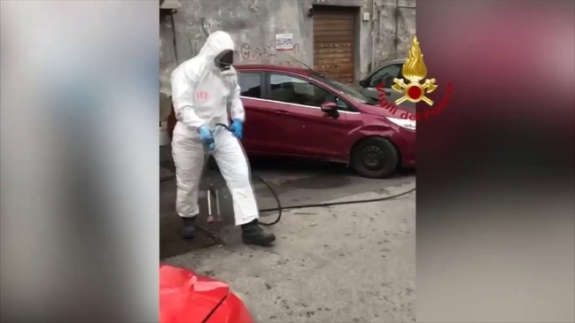 Italian Firefighters Spray Disinfectant in Public Areas in Naples