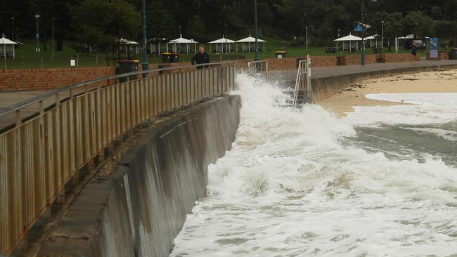 The large swells were smashing into the seawall at Bronte Beach on Friday morning. Picture John Grainger