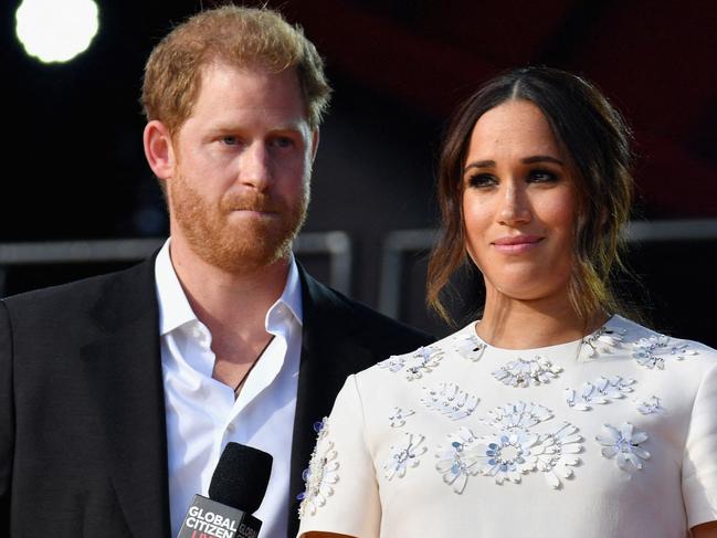 (FILES) Britain's Prince Harry and Meghan Markle speak during the 2021 Global Citizen Live festival at the Great Lawn, Central Park on September 25, 2021 in New York City. A multi-million-dollar deal between a media group run by Britain's Prince Harry and his wife Meghan Markle, and streaming giant Spotify is to end, a report said June 15, 2023. (Photo by Angela Weiss / AFP)