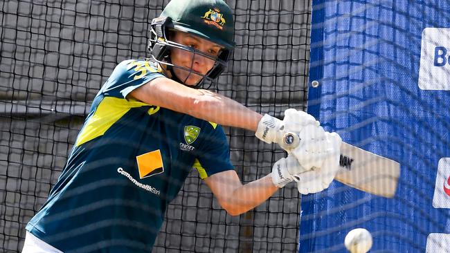 Australia's Nic Carey bats in the nets ahead of the Twenty20 women's World Cup cricket final, in Melbourne. Picture: AFP.