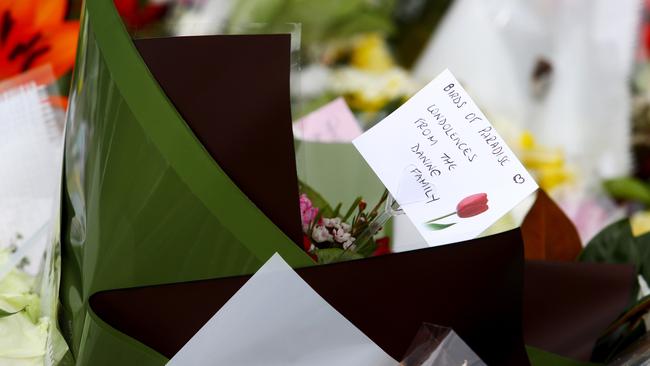 Flowers and message of support dropped off at the school gates today. Picture: Hollie Adams/The Australian
