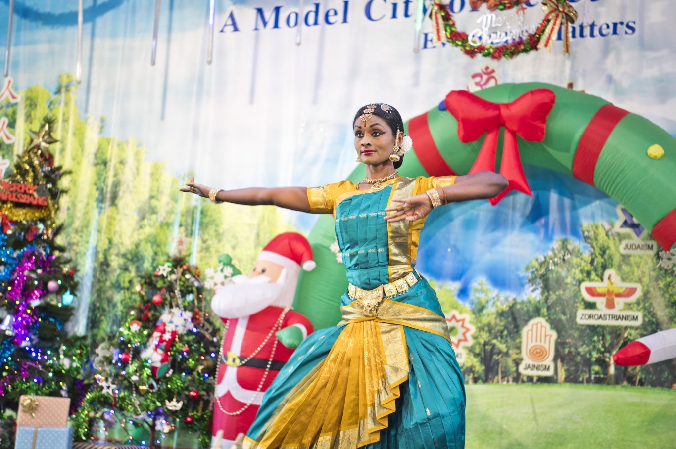 Amutha Kandasamy from Hridayam dance school performs the Bharathanatyum a classical South Indian dance. Pure Land Learning College Christmas party. Picture: Nev Madsen. Saturday 14th Dec, 2019