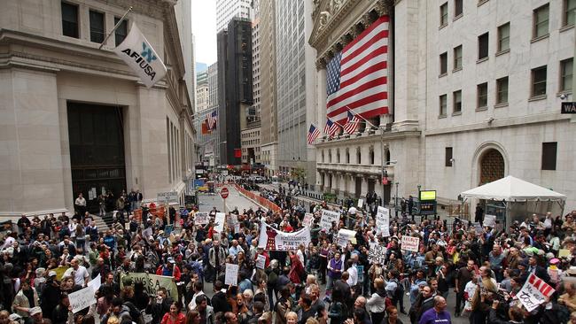 People rally in front of the New York Stock Exchange against the proposed government buyout of financial firms in 2008.