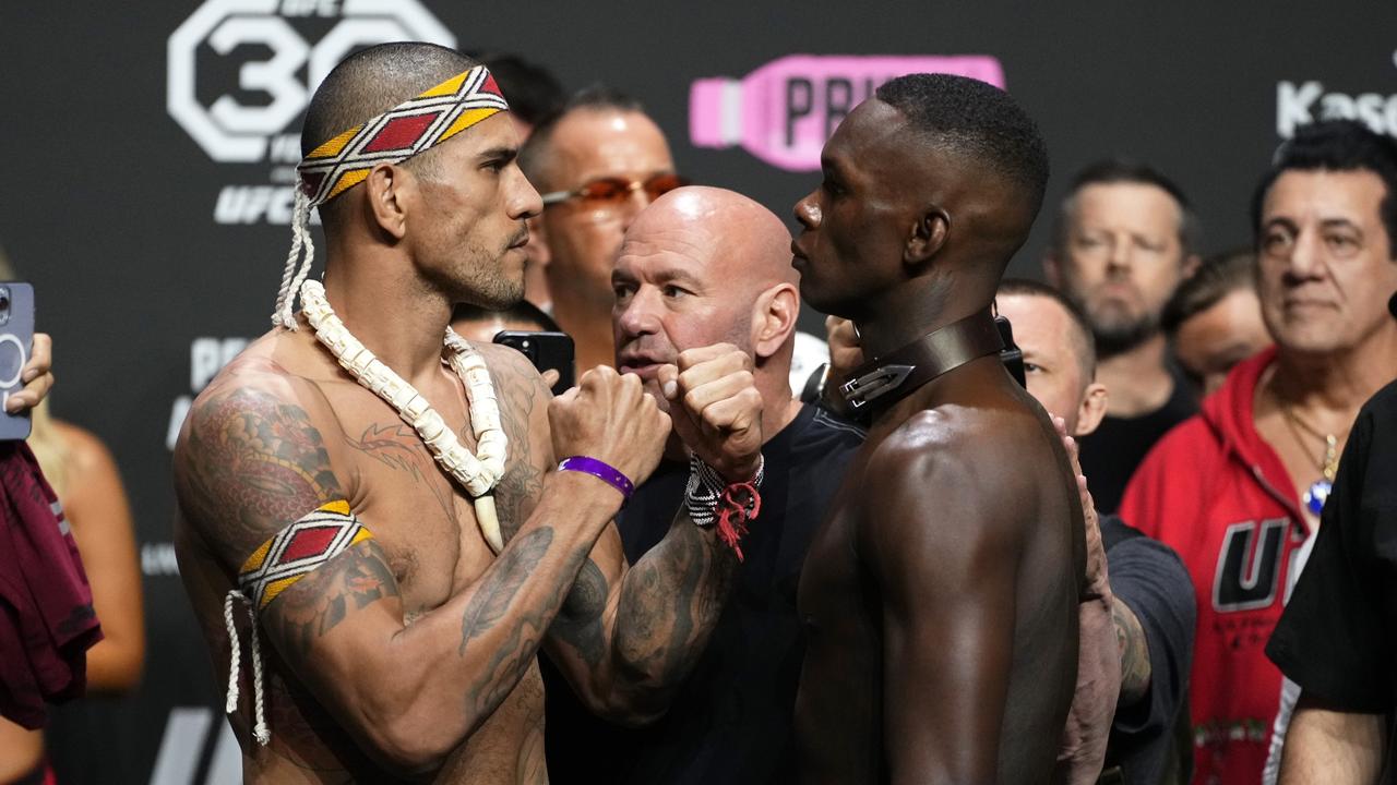 Opponents Alex Pereira and Israel Adesanya face off during the UFC 287 ceremonial weigh-in. (Photo by Jeff Bottari/Zuffa LLC via Getty Images)