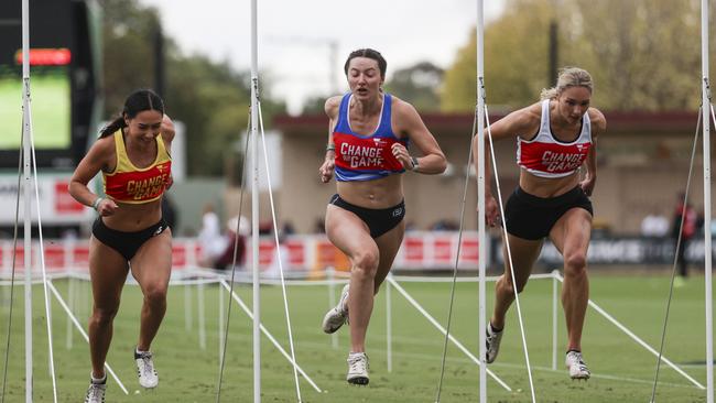 Carla Bull (centre) powers to victory. Picture: Luke Hemer