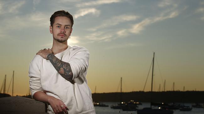 Mitch Wallis at Balmoral Beach. Mitch is the founder of Heart on My Sleeve, a Mental health initiative where people share their mental Health stories for the benefit of others and themselves. Picture: John Appleyard