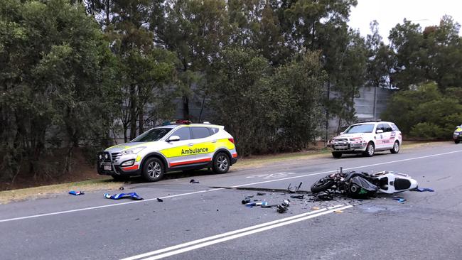 A motorcyclist has collided with a car collision on the Old Pacific Highway at Pimpama today.