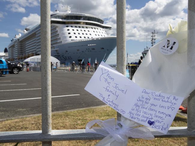 Messages left behind, along with flowers, for those affected and killed by White Island’s volcano eruption. Picture: Brett Phibbs