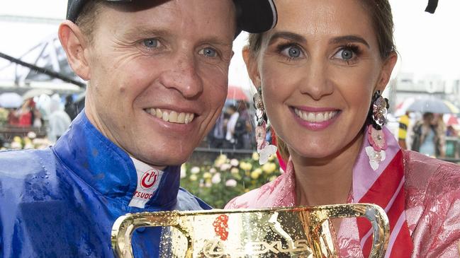 Kerrin McEvoy shares his Cup success with wife Cathy at Flemington. Picture: Jay Town