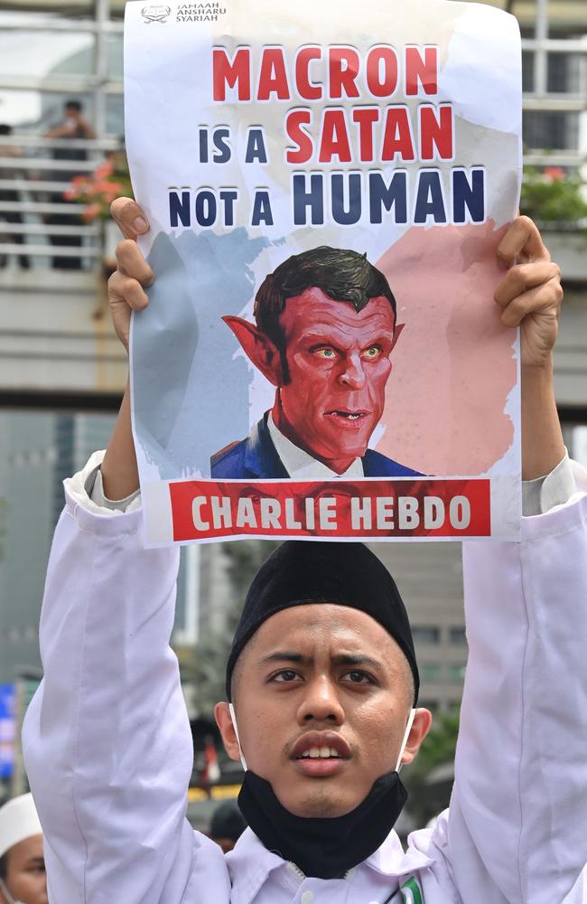 A Muslim protester outside the French embassy. Picture: Adek Berry