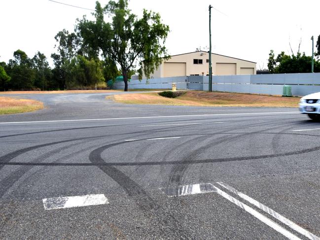 The condition of the road outside Rockhampton Memorial Gardens following mourners' burn outs