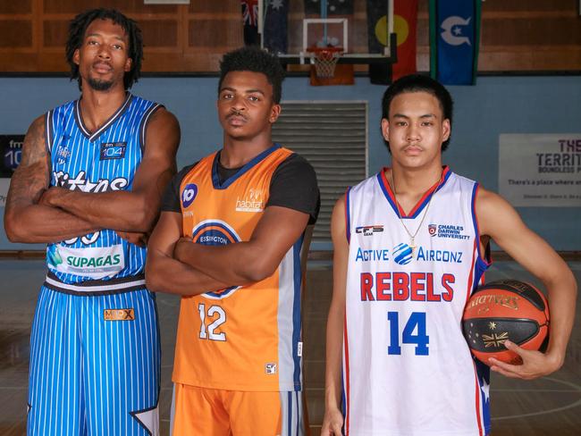 Key Ellas signing Raymond Jarrett, Cannons captain Elijah Barbour and Uni Rebels’ Mixon Laurel at the 2021 Darwin Basketball League season launch. Picture: Glenn Campbell