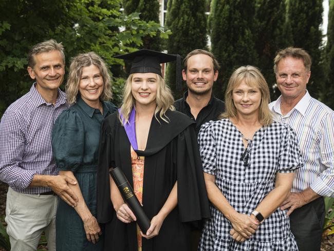 Bachelor of Laws graduate Katie Cottle with Peter and Julie Bedelkovski (left) and Alan, Tania and Alan Cottle at a UniSQ graduation ceremony at Empire Theatres, Tuesday, February 13, 2024. Picture: Kevin Farmer