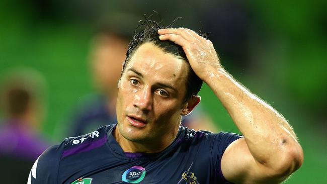 MELBOURNE, AUSTRALIA - APRIL 11: Cooper Cronk of the Storm walks off after a loss during the round six NRL match between the Melbourne Storm and the Canterbury Bulldogs at AAMI Park on April 11, 2016 in Melbourne, Australia. (Photo by Robert Prezioso/Getty Images)