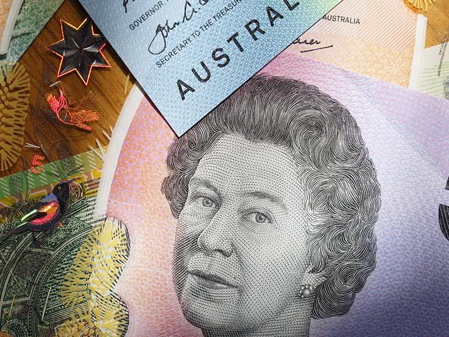 Australian five, ten and fifty dollar bills in a panoramic format with image distortion. The new issue is designed to deter counterfeiting, the note is polymer and water resistant. generic money