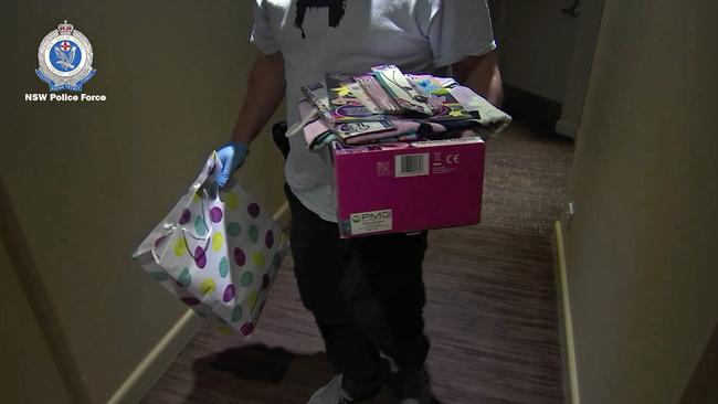 Children’s toys, mobile phones and a laptop were seized during a search of the room. Picture: NSW Police