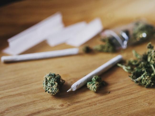 Shot of dried marijuana and a rolled joint. Cannabis clipseal bag generic image. Picture: iStock