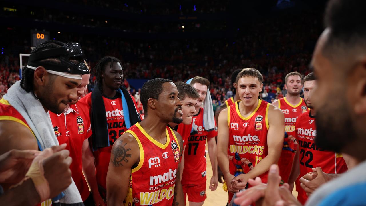 Bryce Cotton addresses the Wildcats after clutching up with two free throws to give the Wildcats a one-point win. Picture: Getty Images