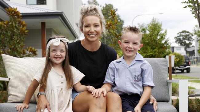 Mum Kye Hudson is happy for her kids Spencer-Rose and Logan to be returning to school. Picture: Jonathan Ng