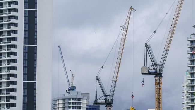 There are plenty of cranes in the sky but not enough to keep pace with population growth. Picture: Glenn Campbell